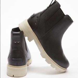 Black leather sorel booties with white soles. Brand new!